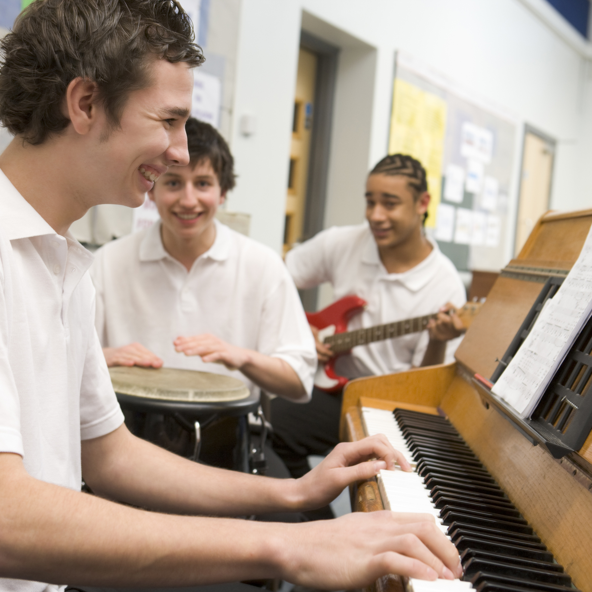 2127738 Schoolboys Playing Musical Instruments In Music Class (1)