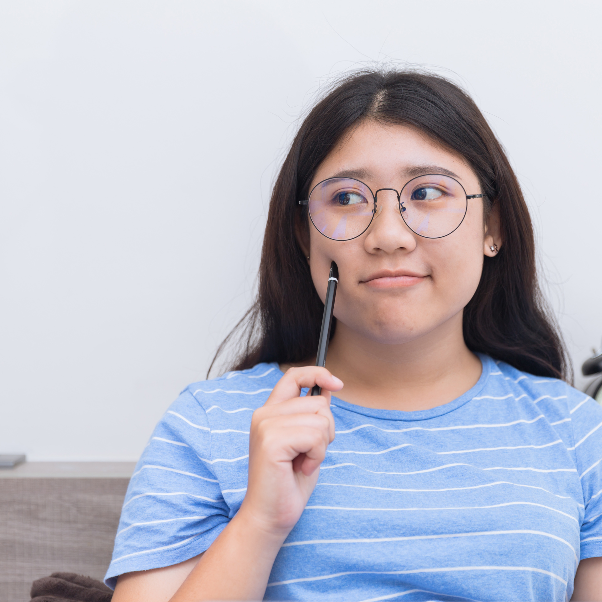 52857673 Asian Girl Teen Thinking Consider About Work Plus Size