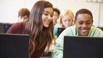 11829073 Group Of High School Students In Class Using Laptops