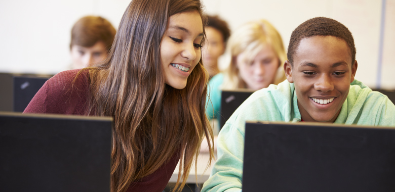 11829073 Group Of High School Students In Class Using Laptops