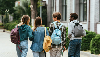 42823854 Back View Of Multiethnic Teenagers With Backpacks